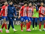 Atletico Madrid's players celebrate their victory at the end of the Spanish Copa del Rey (King's Cup) quarter final football match between Club Atletico de Madrid and Sevilla FC Atletico Madrid's players celebrate their victory at the end of the Spanish Copa del Rey (King's Cup) quarter final football match between Club Atletico de Madrid and Sevilla FC