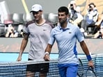 Italy's Jannik Sinner greets Serbia's Novak Djokovic after victory in their men's singles semi-final match on day 13 of the Australian Open. Italy's Jannik Sinner greets Serbia's Novak Djokovic after victory in their men's singles semi-final match on day 13 of the Australian Open.