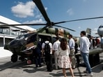 FILE PHOTO: Students from the University of Stuttgart visit an Airbus H145M helicopter at the 54th International Paris Airshow at Le Bourget Airport near Paris, France, June 21, 2023.