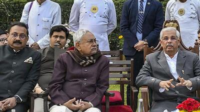 (From left) Bihar minister and JD(U) leader Ashok Choudhury, chief minister Nitish Kumar and governor Rajendra Vishwanath Arlekar at the Raj Bhavan in Patna on Friday (PTI) (From left) Bihar minister and JD(U) leader Ashok Choudhury, chief minister Nitish Kumar and governor Rajendra Vishwanath Arlekar at the Raj Bhavan in Patna on Friday (PTI)