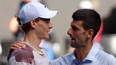 Jannik Sinner and Novak Djokovic after their Australian Open semi-final. (AP)