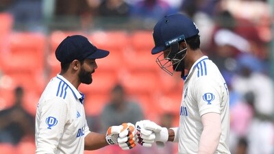 India's Ravindra Jadeja (L) and India's KL Rahul bump fists (AFP) India's Ravindra Jadeja (L) and India's KL Rahul bump fists (AFP)