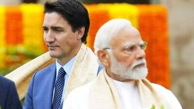 Canada’s Prime Minister Justin Trudeau walks past Indian PM Narendra Modi (AP) Canada’s Prime Minister Justin Trudeau walks past Indian PM Narendra Modi (AP)