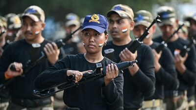 Commandos from Indian Central Industrial Security Force (CISF) demonstrates their skills during the Republic Day celebrations at Chennai International Airport in Chennai on January 26,. (AFP) Commandos from Indian Central Industrial Security Force (CISF) demonstrates their skills during the Republic Day celebrations at Chennai International Airport in Chennai on January 26,. (AFP)