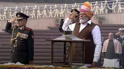 After laying the wreath, PM Modi observed a two-minute silence in homage to the supreme sacrifices of the armed personnel in protecting the nation. Following this, buglers played 'Rouse' and the guards presented 'Salami Shastra' once again. (PTI) After laying the wreath, PM Modi observed a two-minute silence in homage to the supreme sacrifices of the armed personnel in protecting the nation. Following this, buglers played 'Rouse' and the guards presented 'Salami Shastra' once again. (PTI)