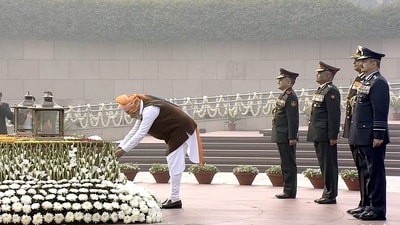 Prime Minister Narendra Modi commenced the Republic Day 2024 celebrations by laying floral tributes at the National War Memorial in Delhi on Friday morning, honoring the bravehearts of the Indian armed forces. (PTI) Prime Minister Narendra Modi commenced the Republic Day 2024 celebrations by laying floral tributes at the National War Memorial in Delhi on Friday morning, honoring the bravehearts of the Indian armed forces. (PTI)