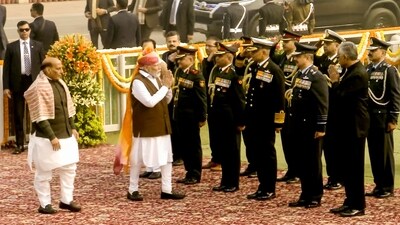 PM Modi was joined by the three service chiefs as he paid his respects at the solemn function. He then proceeded to the Kartavya Path for the Republic Day parade. (PTI) PM Modi was joined by the three service chiefs as he paid his respects at the solemn function. He then proceeded to the Kartavya Path for the Republic Day parade. (PTI)