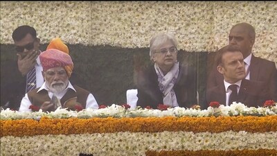 French President Emmanuel Macron on Friday watched India's 75th Republic Day celebrations at the majestic Kartavya Path, joining a select group of global leaders to have graced the nation's biggest ceremonial in the last seven decades. (PTI) French President Emmanuel Macron on Friday watched India's 75th Republic Day celebrations at the majestic Kartavya Path, joining a select group of global leaders to have graced the nation's biggest ceremonial in the last seven decades. (PTI)