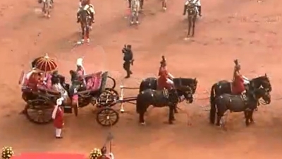President Droupadi Murmu and her French counterpart Emmanuel Macron IN buggy (ANI)