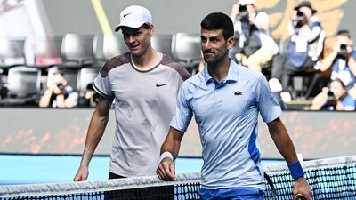 Italy's Jannik Sinner greets Serbia's Novak Djokovic after victory in their men's singles semi-final match on day 13 of the Australian Open. (AFP) Italy's Jannik Sinner greets Serbia's Novak Djokovic after victory in their men's singles semi-final match on day 13 of the Australian Open. (AFP)