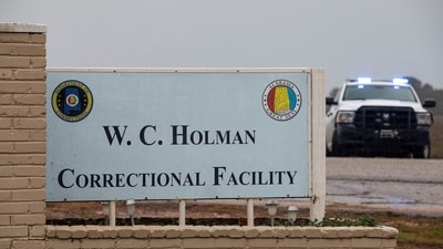 Alabama Nitrogen gas execution: The gate at Holman Correctional Facility is monitored by law enforcement before the scheduled execution by asphyxiation using pure nitrogen of Kenneth Smith. (Reuters)