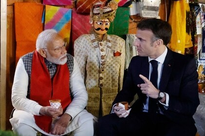 Prime Minister Narendra Modi and French President Emmanuel Macron indulged in chai pe charcha after visiting Hawa Mahal, Jaipur (AFP) Prime Minister Narendra Modi and French President Emmanuel Macron indulged in chai pe charcha after visiting Hawa Mahal, Jaipur (AFP)