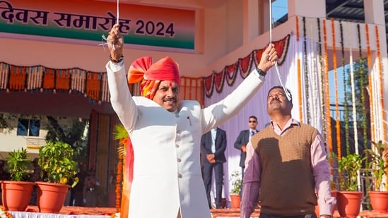 Madhya Pradesh Chief Minister Mohan Yadav releases tri-coloured balloons during 75th Republic Day celebrations at Dussehra Ground in Ujjain.(PTI)