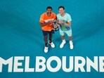 Rohan Bopanna, left, of India and Matthew Ebden of Australia pose with their trophy after defeating Simone Bolelli and Andrea Vavassori of Italy in the men's doubles final.