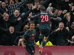 Manchester City•s Nathan Ake, left, celebrates after scoring the opening goal during the English FA Cup fourth round soccer match between Tottenham Hotspur and Manchester City