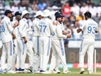 India's Jasprit Bumrah (R) celebrates with captain Rohit Sharma (2R) India's Jasprit Bumrah (R) celebrates with captain Rohit Sharma (2R)