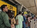 Passengers in a queue in front of the Digi Yatra app kiosk at Gate D1 of Pune’s Lohegaon international airport on Wednesday. (Shankar Narayan/HT PHOTO)