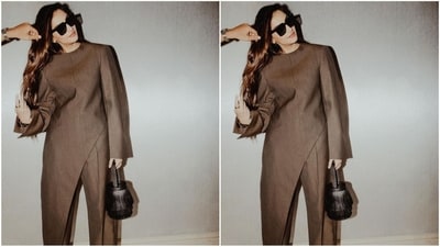 Assisted by her talented fashion stylist sister Rhea Kapoor, Sonam accessorised her look with a trendy brown bucket bag, a pair of black rectangular sunglasses and black pump high heels that perfectly complemented her classy look. (Instagram/@sonamkapoor) Assisted by her talented fashion stylist sister Rhea Kapoor, Sonam accessorised her look with a trendy brown bucket bag, a pair of black rectangular sunglasses and black pump high heels that perfectly complemented her classy look. (Instagram/@sonamkapoor)