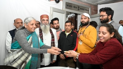 New Delhi, Jan 24 (ANI): Union Finance Minister Nirmala Sitharaman during the Halwa ceremony as the final stage preparations for the Interim Union Budget 2024 commences, in New Delhi on Wednesday. (ANI Photo) New Delhi, Jan 24 (ANI): Union Finance Minister Nirmala Sitharaman during the Halwa ceremony as the final stage preparations for the Interim Union Budget 2024 commences, in New Delhi on Wednesday. (ANI Photo)