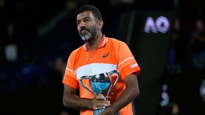 Rohan Bopanna of India holds his trophy after he and partner Matthew Ebden won the Australian Open 2024 (AP) Rohan Bopanna of India holds his trophy after he and partner Matthew Ebden won the Australian Open 2024 (AP)