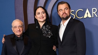 Martin Scorsese, Lily Gladstone and Leonardo DiCaprio pose together at the 14th Governors Awards in Los Angeles (Reuters)