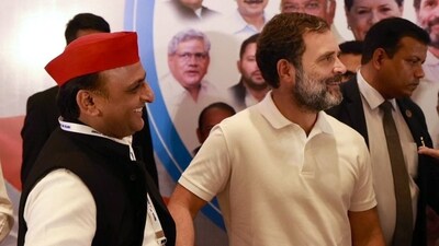 SP president Akhilesh Yadav with Congress leader Rahul Gandhi. (File) SP president Akhilesh Yadav with Congress leader Rahul Gandhi. (File)