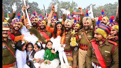 Punjab Police personnel celebrating after winning the overall trophy during the Republic Day celebrations at Parade Ground, Sector 17, Chandigarh, on Friday. (Keshav Singh/HT) Punjab Police personnel celebrating after winning the overall trophy during the Republic Day celebrations at Parade Ground, Sector 17, Chandigarh, on Friday. (Keshav Singh/HT)