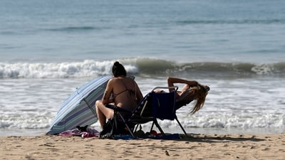 People across southern Europe are heading to the beaches to sunbathe or take a winter swim as a hot spell has created an almost summer-like atmosphere in many coastal areas. (AFP) People across southern Europe are heading to the beaches to sunbathe or take a winter swim as a hot spell has created an almost summer-like atmosphere in many coastal areas. (AFP)