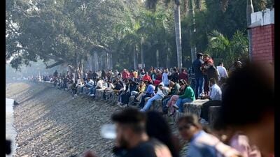 Visitors enjoying the sunny weather at Sukhna Lake, Chandigarh, on Saturday. (Ravi Kumar/HT) Visitors enjoying the sunny weather at Sukhna Lake, Chandigarh, on Saturday. (Ravi Kumar/HT)