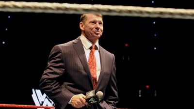 Vince McMahon speaks to an audience during a WWE fan appreciation event (AP)