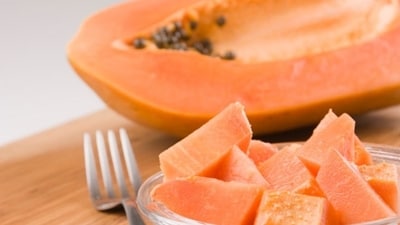 Papaya, thanks to its digestive enzyme papain and loads of dietary fibre, is a superfood for your gut health (Unsplash) Papaya, thanks to its digestive enzyme papain and loads of dietary fibre, is a superfood for your gut health (Unsplash)