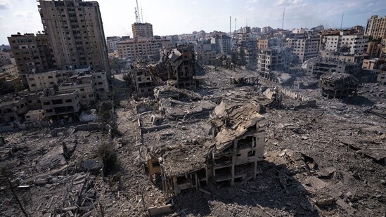 Israel-Hamas war: A view of the rubble of buildings hit by an Israeli airstrike in Gaza City (AP)