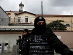 Turkish police stand guard outside the Italian Santa Maria Catholic Church after two masked gunmen shot one person dead during Sunday service, in Istanbul, Turkey