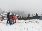 Snowfall in the higher reaches and cloudy skies in the plains pushed the minimum temperatures above the freezing point in most parts of Kashmir on Sunday.(HT Photo)