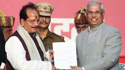 BJP leader Vijay Kumar Sinha, after taking the oath as State Deputy Chief Minister, shared a moment with Bihar Governor Rajendra Vishwanath Arlekar during the swearing-in ceremony at Raj Bhavan. (ANI) BJP leader Vijay Kumar Sinha, after taking the oath as State Deputy Chief Minister, shared a moment with Bihar Governor Rajendra Vishwanath Arlekar during the swearing-in ceremony at Raj Bhavan. (ANI)