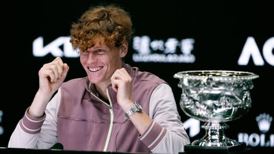 Jannik Sinner of Italy reacts at a press conference following his win over Daniil Medvedev of Russia in the men's singles final at the Australian Open tennis championships at Melbourne Park, in Melbourne, Australia, Monday, Jan. 29 (AP) Jannik Sinner of Italy reacts at a press conference following his win over Daniil Medvedev of Russia in the men's singles final at the Australian Open tennis championships at Melbourne Park, in Melbourne, Australia, Monday, Jan. 29 (AP)
