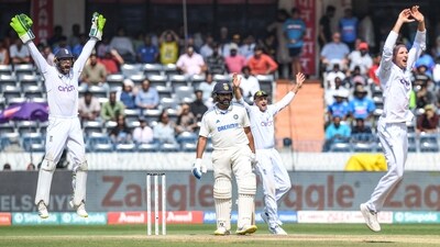 England's wicketkeeper Ben Foakes (L), Tom Hartley (R) and Joe Root (2R) celebrate after the dismissal of India's captain Rohit Sharma (AFP) England's wicketkeeper Ben Foakes (L), Tom Hartley (R) and Joe Root (2R) celebrate after the dismissal of India's captain Rohit Sharma (AFP)