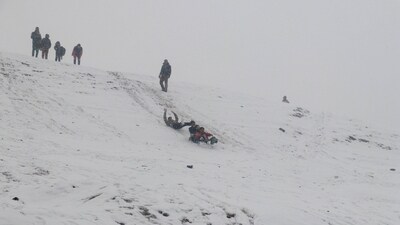 Kashmir is currently under the grip of "Chilla-i-Kalan," a 40-day harsh winter period during which a cold wave sweeps the region, causing a considerable drop in temperatures and leading to the freezing of water bodies and pipes. In the picture, tourists are seen sleighing down the slope in the snowy Gulmarg region on Sunday. (HT Photo) Kashmir is currently under the grip of "Chilla-i-Kalan," a 40-day harsh winter period during which a cold wave sweeps the region, causing a considerable drop in temperatures and leading to the freezing of water bodies and pipes. In the picture, tourists are seen sleighing down the slope in the snowy Gulmarg region on Sunday. (HT Photo)