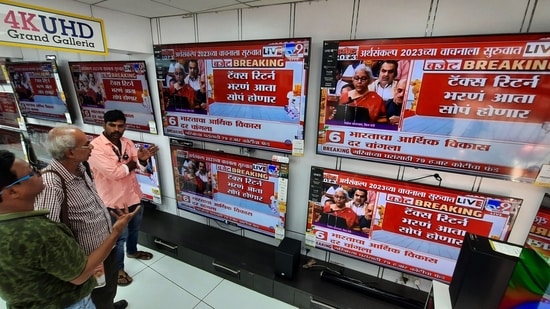People watch the Union Budget 2023 being presented by Finance Minister Nirmala Sitharaman in the Parliament. (HT PHOTO) People watch the Union Budget 2023 being presented by Finance Minister Nirmala Sitharaman in the Parliament. (HT PHOTO)