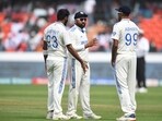 India's captain Rohit Sharma (C), Jasprit Bumrah (L) and Ravichandran Ashwin speak during the third day of the first Test cricket match between India and England at the Rajiv Gandhi International Stadium in Hyderabad on January 27 India's captain Rohit Sharma (C), Jasprit Bumrah (L) and Ravichandran Ashwin speak during the third day of the first Test cricket match between India and England at the Rajiv Gandhi International Stadium in Hyderabad on January 27