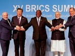 FILE PHOTO: President of Brazil Luiz Inacio Lula da Silva, President of China Xi Jinping, South African President Cyril Ramaphosa, Prime Minister of India Narendra Modi and Russia's Foreign Minister Sergei Lavrov pose for a BRICS family photo during the 2023 BRICS Summit at the Sandton Convention Centre in Johannesburg, South Africa, on August 23, 2023.  GIANLUIGI GUERCIA/Pool via REUTERS//File Photo