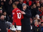 Manchester United's Marcus Rashford with manager Erik ten Hag after being substituted 