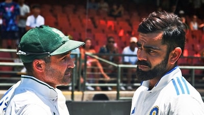 India's Virat Kohli interacts with retiring Dean Elgar after gifting a signed jersey on behalf of Team India (ICC - X) India's Virat Kohli interacts with retiring Dean Elgar after gifting a signed jersey on behalf of Team India (ICC - X)