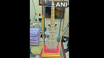 The silver broom that was gifted to Ayodhya Ram Mandir by devotees from Madhya Pradesh. (X/ANI)