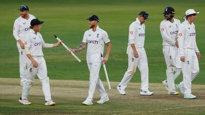 England's Ben Stokes celebrates with Ollie Pope and teammates after winning the first Test match (REUTERS)