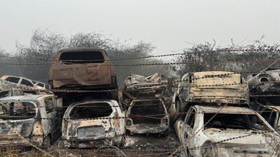 Charred remains of the vehicles after the fire. (HT Photo) Charred remains of the vehicles after the fire. (HT Photo)