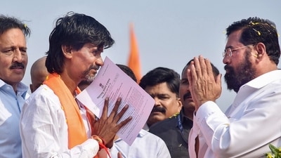 Maharashtra Chief Minister Eknath Shinde with Maratha reservation activist Manoj Jarange Patil at the protest venue after the state government accepted the latter's demands. (PTI) Maharashtra Chief Minister Eknath Shinde with Maratha reservation activist Manoj Jarange Patil at the protest venue after the state government accepted the latter's demands. (PTI)
