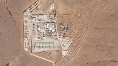 This handout satellite picture released by Planet Labs PBC shows a view of the base, known as Tower 22, which is operated by US troops as part of an international coalition against the Islamic State (IS)  jihadist group, near Jordan's border with Iraq and Syria. (AFP)
