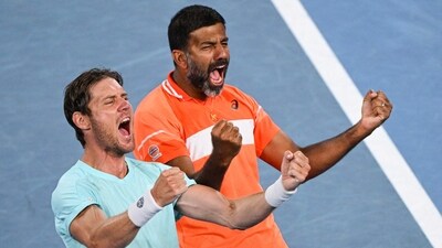 India's Rohan Bopanna (R) and Australia's Matthew Ebden celebrate after victory against Italy's Simone Bolelli and Andrea Vavassori during their men's doubles final match on day 14 of the Australian Open. (AFP) India's Rohan Bopanna (R) and Australia's Matthew Ebden celebrate after victory against Italy's Simone Bolelli and Andrea Vavassori during their men's doubles final match on day 14 of the Australian Open. (AFP)