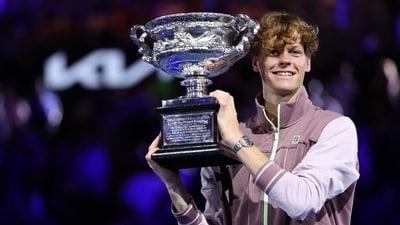 Italy's Jannik Sinner celebrates with the Norman Brookes Challenge Cup trophy after defeating Russia's Daniil Medvedev (AFP) Italy's Jannik Sinner celebrates with the Norman Brookes Challenge Cup trophy after defeating Russia's Daniil Medvedev (AFP)